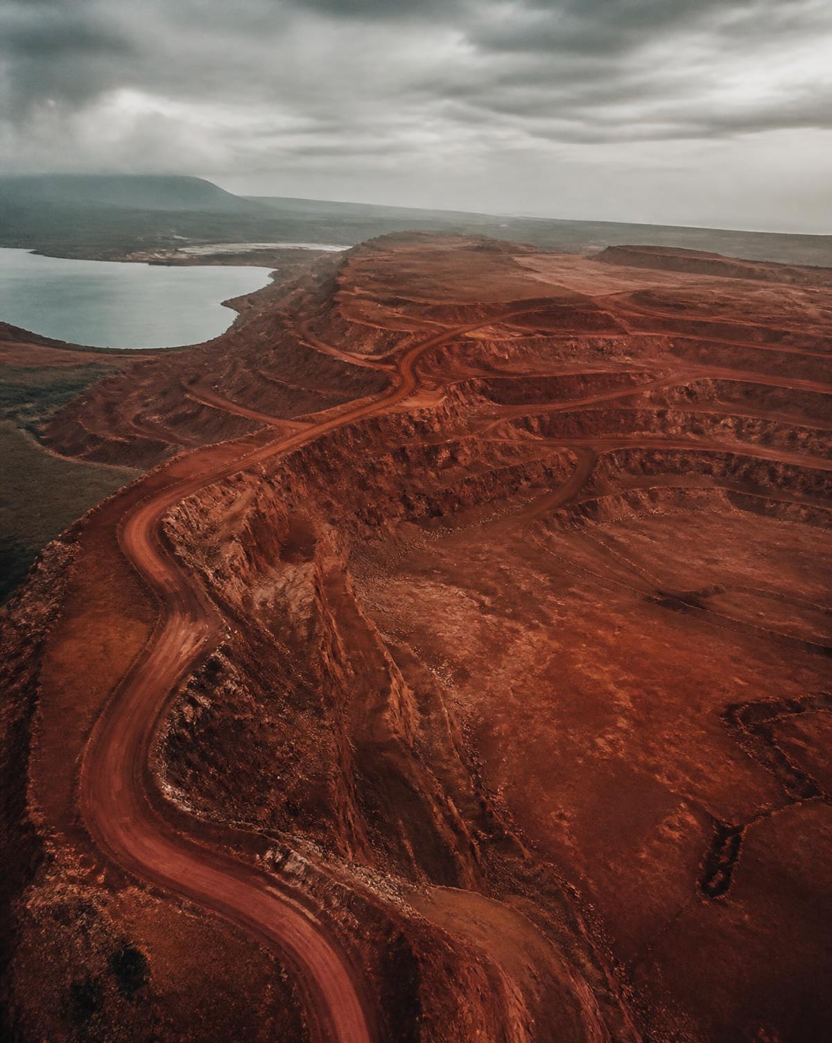 Reddish-brown bauxite terrain with exposed benches near Balaghat