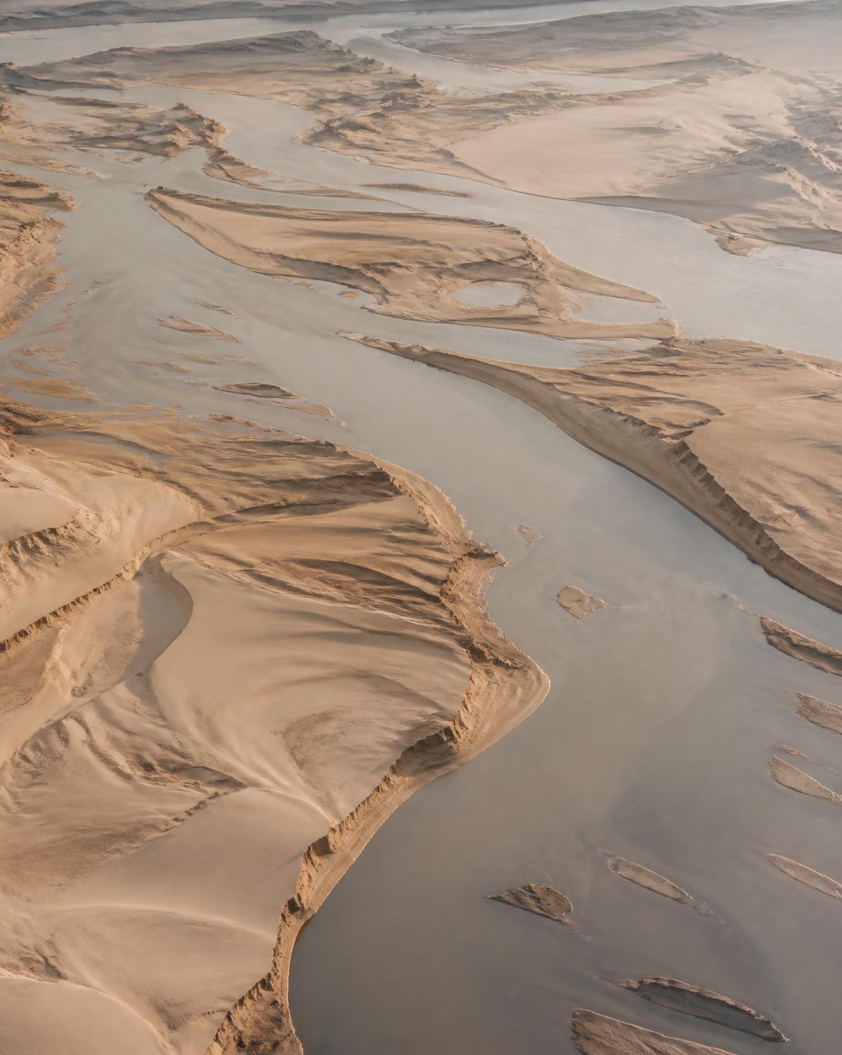 Wide river channel with exposed sandbars in the Bundelkhand region